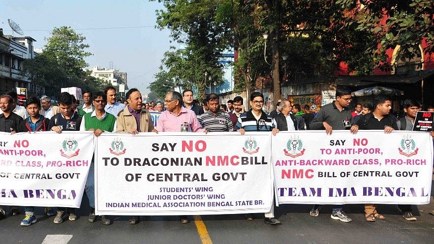 Doctors and medical students staged a protest against the National Medical Commission (NMC) Bill that was passed today in the Upper House.&nbsp;