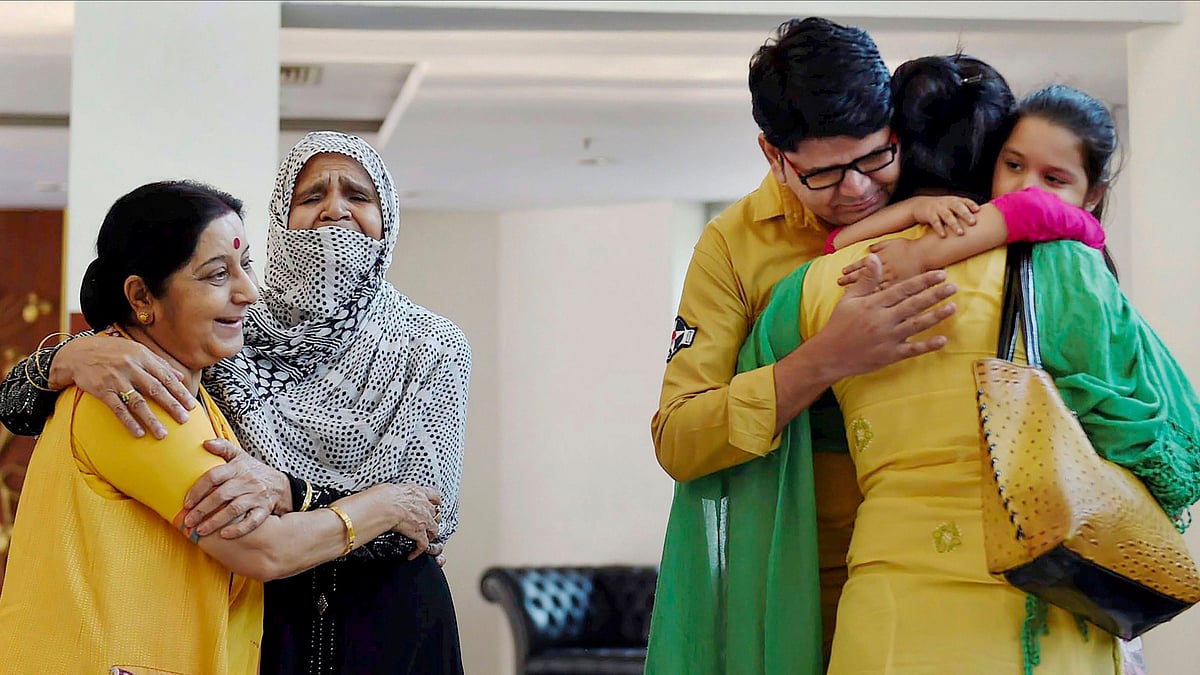  In this 25 May 2017 file photo, Sushma Swaraj is seen with Uzma Ahmed as she gets emotional while uniting with her family during a press conference at Jawahar Bhawan in New Delhi.