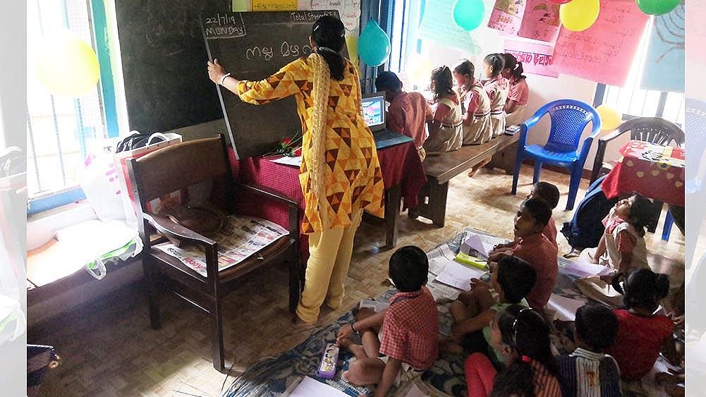Children learn Malayalam as part of Roshini, a program to help children of migrant workers in Ernakulam learn Malayalam in government and government-aided schools, through the use of multiple languages, including their mother tongue.
