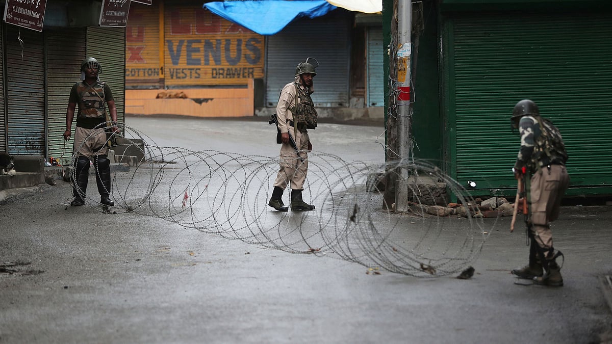 Indian paramilitary soldiers close a street using barbwire in Srinagar, J&K. (Image used for representational purposes only)