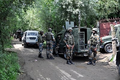 Shopian: Security personnel during search operations after two Army soldiers were killed in an encounter with militants at Pandushan village in South Kashmir