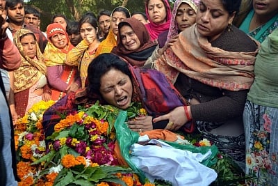 Etah: Last rites of Police Inspector Subodh Kumar Singh, who was killed in a mob violence in Bulandshahr district of western Uttar Pradesh on Monday, underway in his ancestral village Jaithra in Etah district of Uttar Pradesh on Dec 4, 2018. (Photo: IANS)