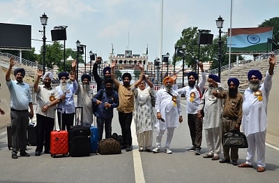 Amritsar: Sikh devotees leaving for Pakistan to participate in 550th birth anniversary celebrations of Guru Nanak Dev, at Attari-Wagah border near Amritsar on July 30, 2019. (Photo: IANS)