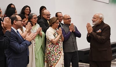 Houston: Prime Minister Narendra Modi meets a delegation of Kashmiri Pandits in Houston, US on Sep 22, 2019. (Photo: IANS/MEA)