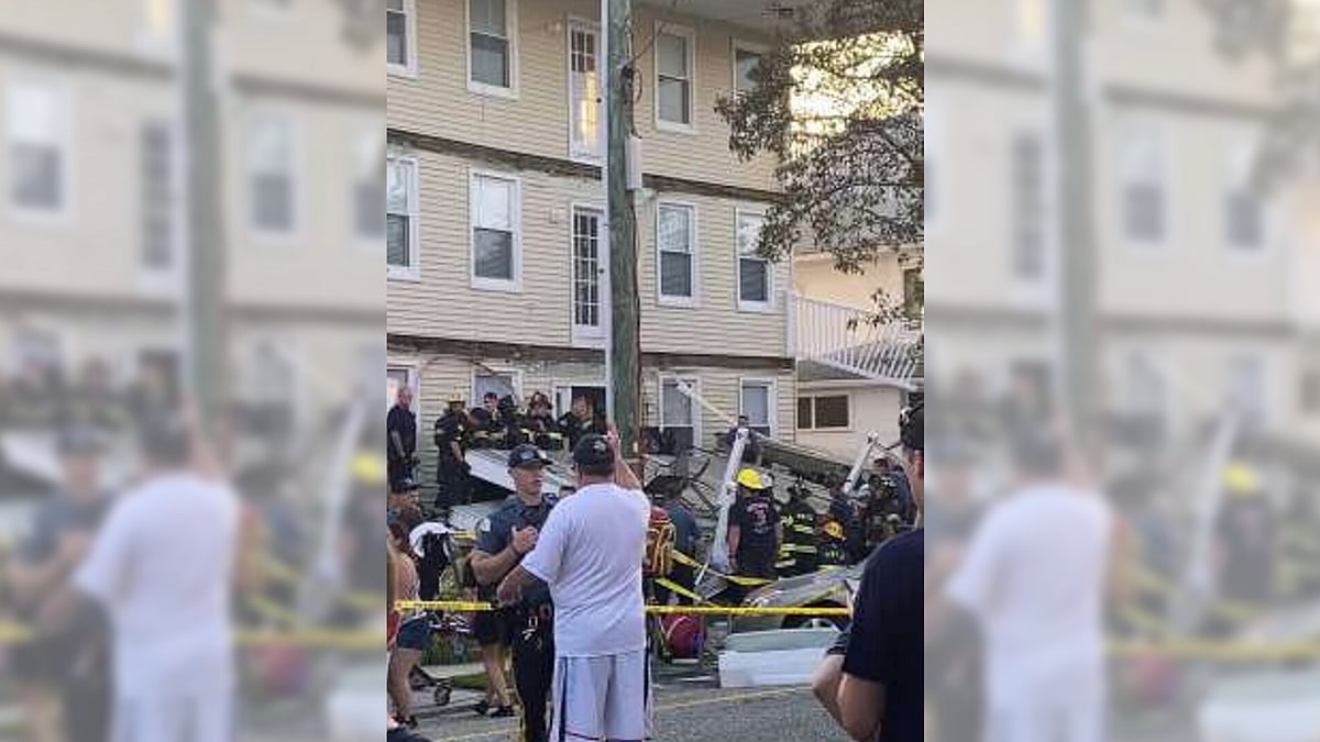 In this photo provided by James Macheda, first responders work the scene of a building structure damage in Wildwood, New Jersey, on Saturday, 14 September 2019. Multiple levels of decking attached to a building collapsed Saturday evening at the Jersey Shore, trapping people and injuring several, including children, officials and witnesses said. 