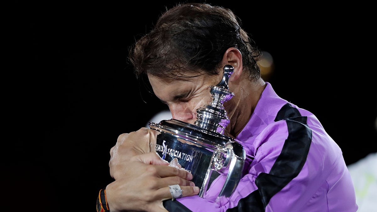 Rafael Nadal celebrated a dramatic US Open final victory over Daniil Medvedev for his 19th Grand Slam title.
