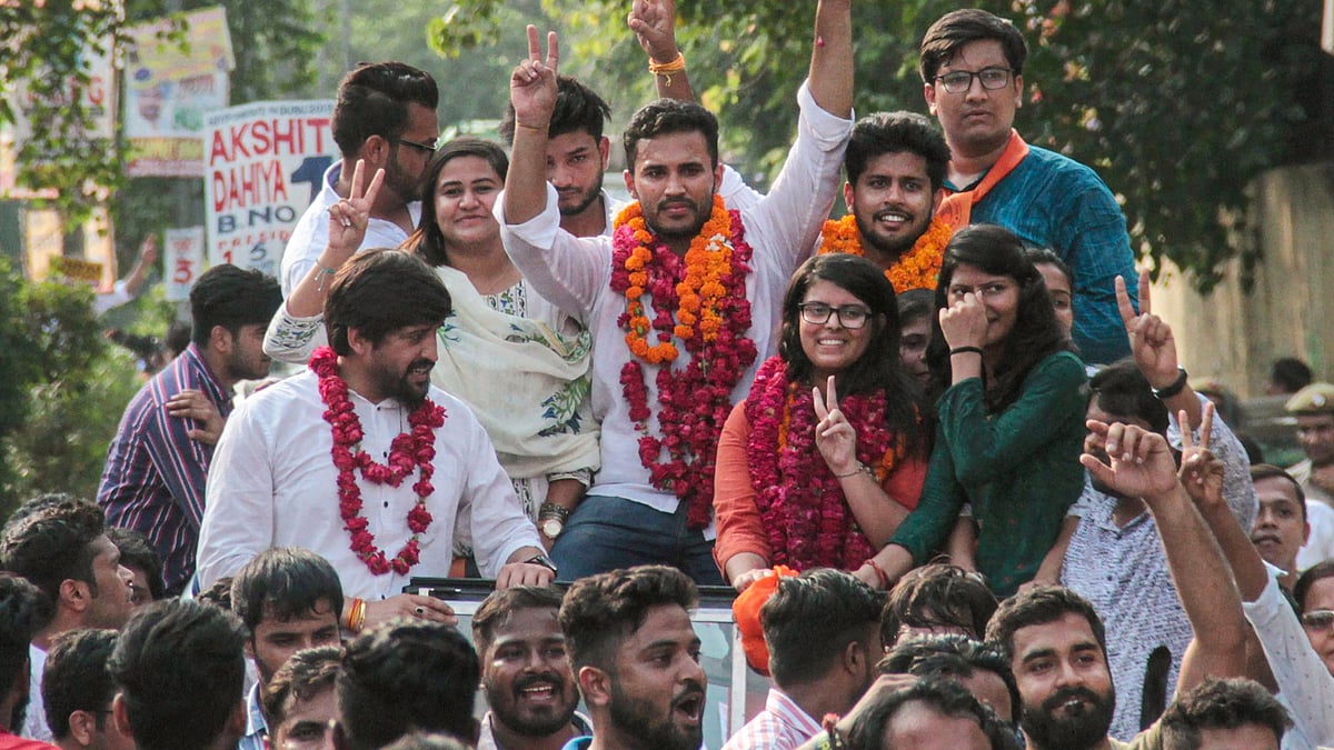 ABVP candidates Akshit Dahiya, Pradeep Tanwar and Shivangi Kharwal celebrate after winning the DUSU elections.