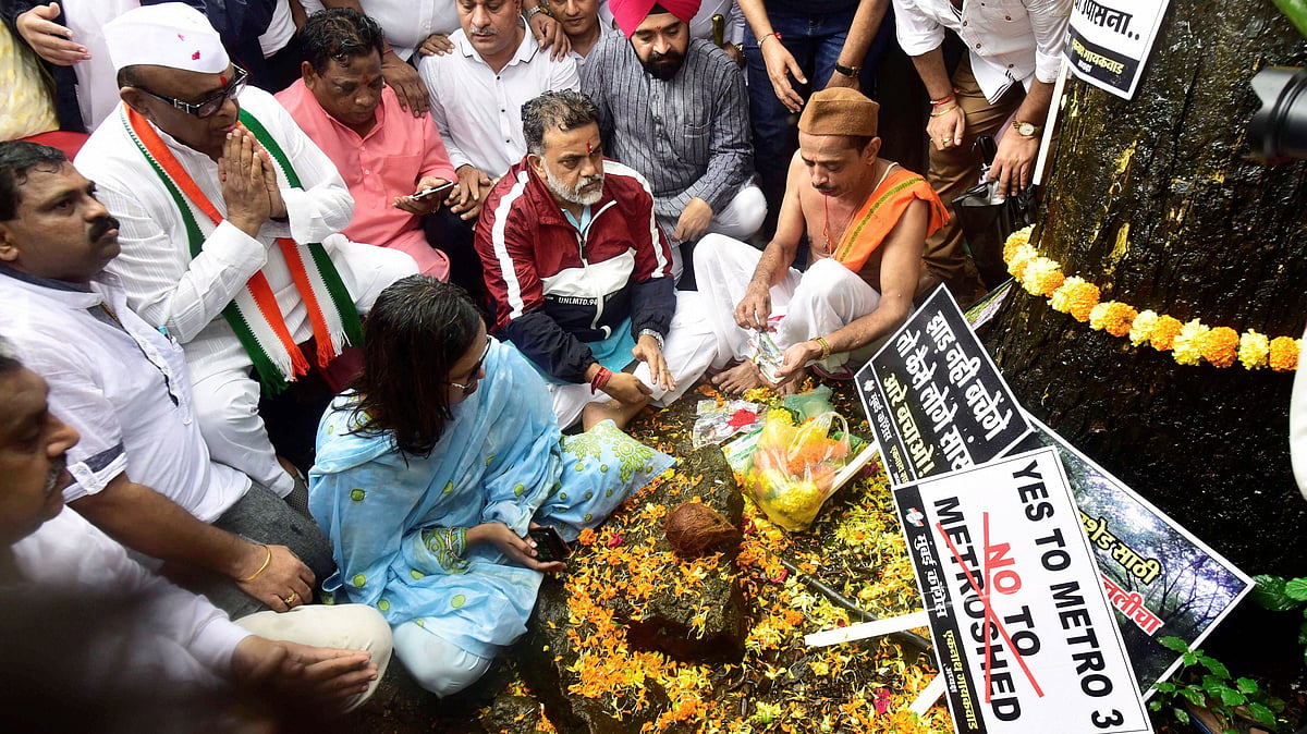 Mumbai Congress workers along with save Aarey activists and local residents participate in a programme organised to protest against the cutting of 2,700 trees.