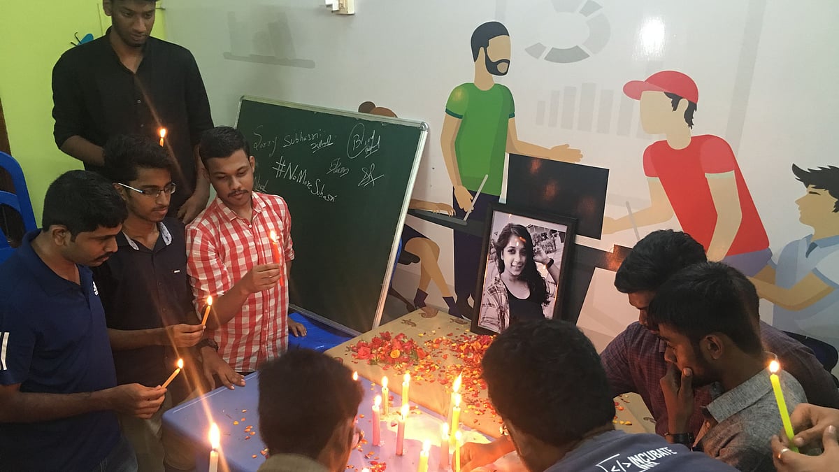 Friends light candles and share fond memories of their dear friend Subhasri.&nbsp;