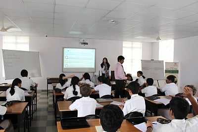 Bengaluru: A female humanoid robot in a class imparting lesson to students of Indus International School in Bengaluru. (Photo: IANS)