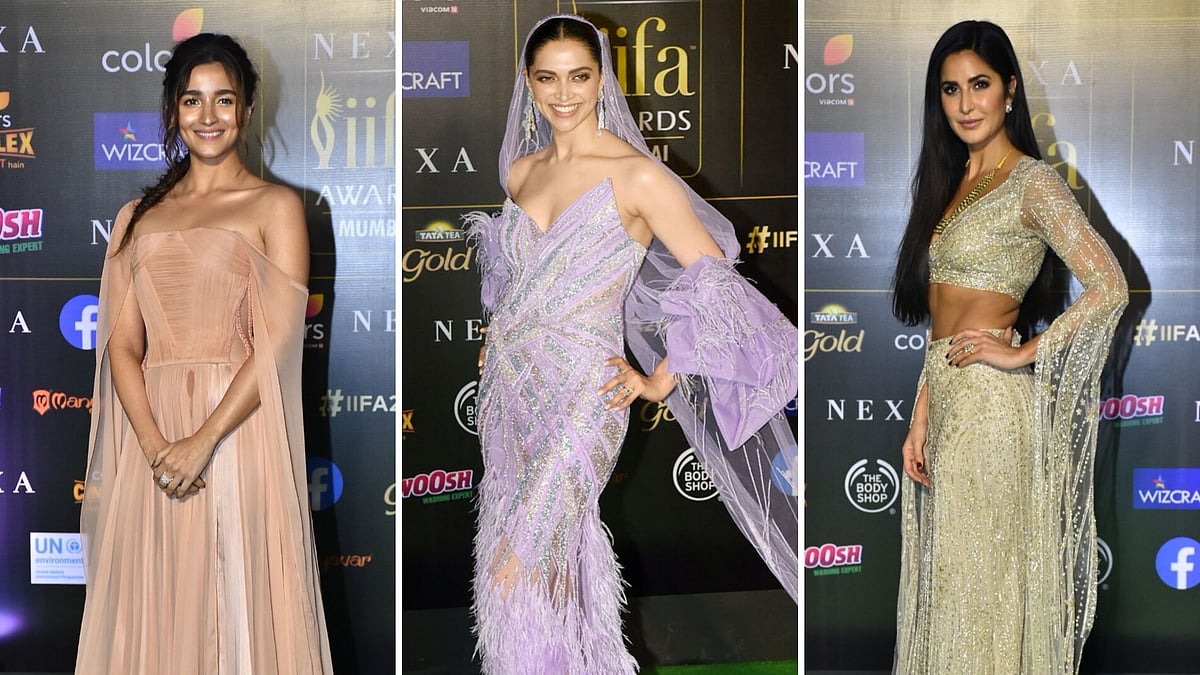 Alia Bhatt (L), Deepika Padukone (C), Katrina Kaif (R) on the IIFA Awards 2019 green carpet.
