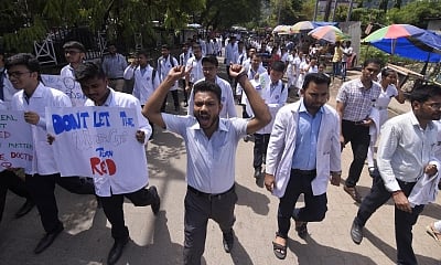 Guwahati: Doctors participate in a protest rally demanding immediate justice for senior doctor Deben Dutta who was thrashed to death, in Guwahati on Sep 3, 2019. The Ministry of Health and Family Welfare has proposed a legislation to address the issue of violence against healthcare professionals and damage to property of clinical establishments across the country. (Photo: IANS)