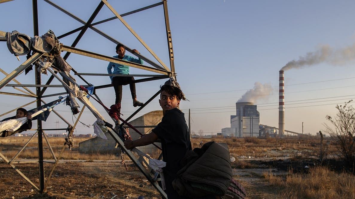 Children playing near a coal-fired power plant in the town of Obilic, Kosovo.