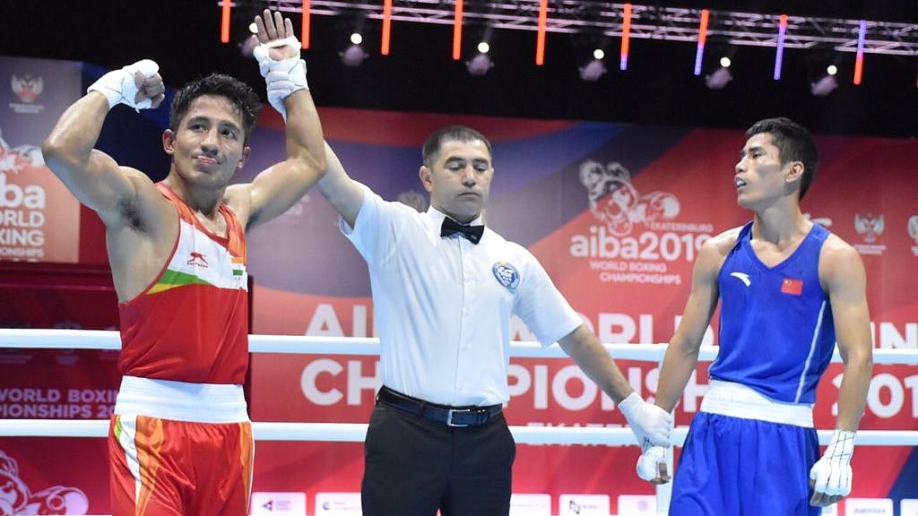 Kavinder (in red) left his rival with a bloodied face before the judges ruled 3-2 in his favour after an exhausting bout.