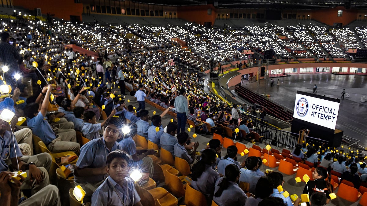 Thousands of students gather for Global Student Solar Assembly at Indira Gandhi Indoor Stadium in New Delhi. Students lit solar lamps in unison in an attempt for Guinness world record attempt.
