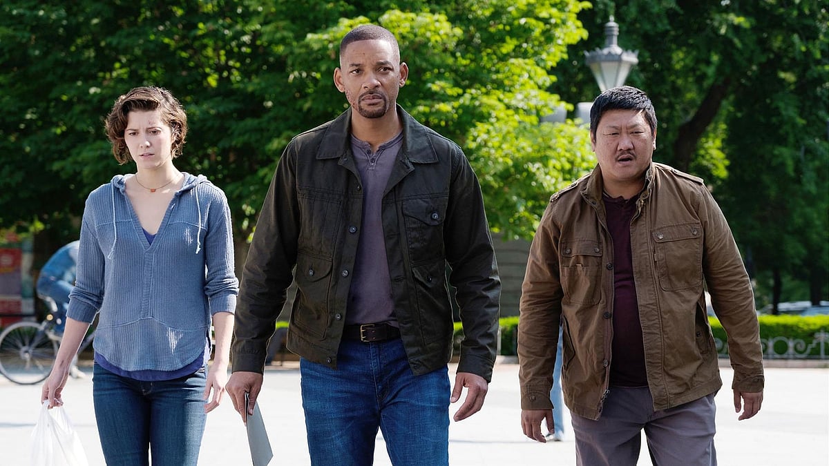 Benedict Wong with co-actors Will Smith and Mary Elizabeth.