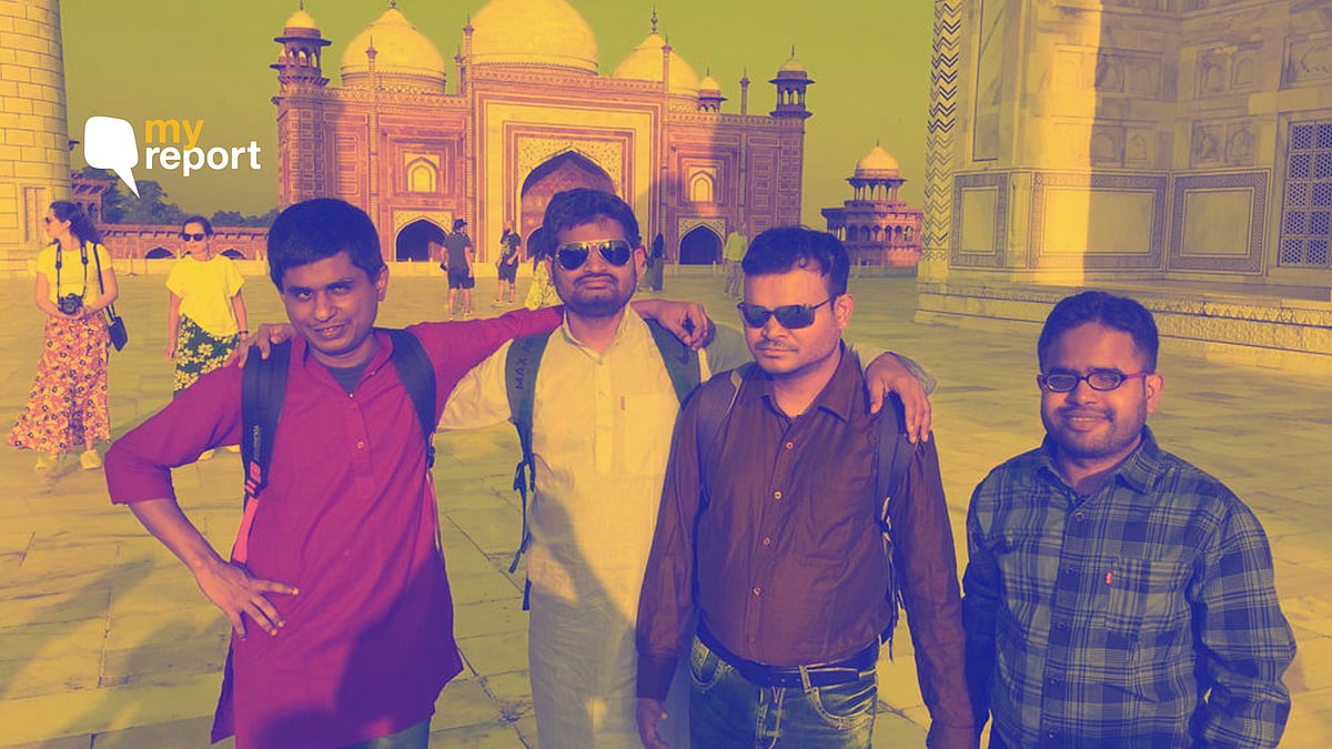 Prasanna Kumar Panda, Basanta Behera, Ananta Kumar Nayak, and Amit Kumar Mohanty pose in front of the Taj Mahal Museum. 