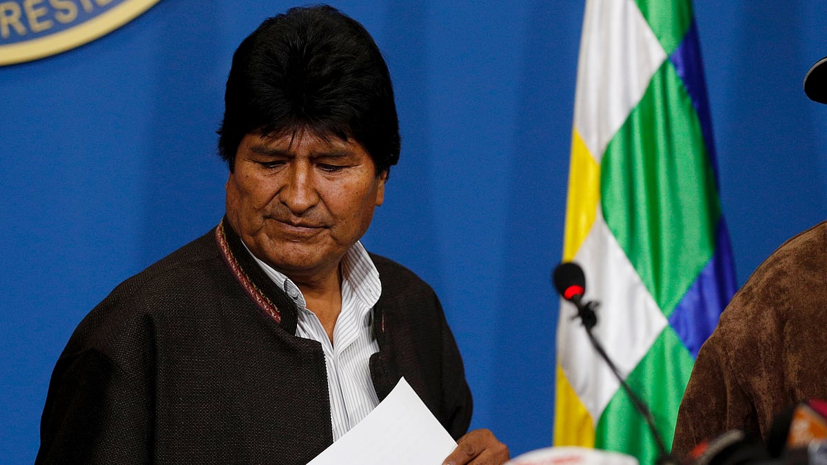 Bolivia’s President Evo Morales looks down during a press conference in La Paz, Bolivia ,Sunday 10 November. 