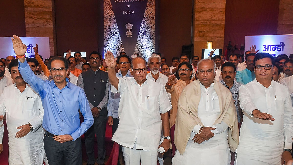 (From left to right) Congress leader Ashok Chavan, Shiv Sena chief Uddhav Thackeray, NCP chief Sharad Pawar, Congress leader Mallikarjun Kharge and MPCC president Balasaheb Thorat at the show of strength by the MLAs of the three parties in Mumbai on 25 November. 