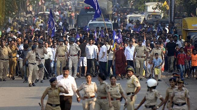 Cops accompany protesters in Mumbai on 2 January 2018 against the violence in Bhima Koregaon in Pune. Image used for representational purposes.