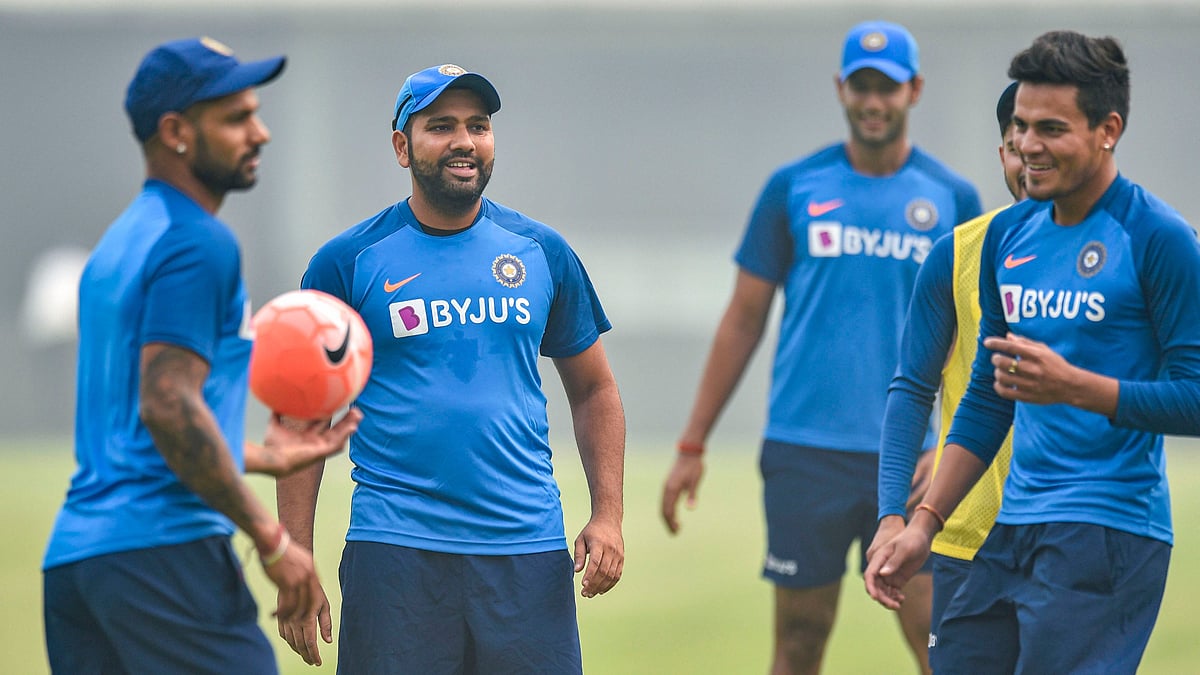 Indian cricketers Rohit Sharma, Shikhar Dhawan and Rahul Chahar during a practice session at Arun Jaitley Stadium in New Delhi on Friday, 1 November.