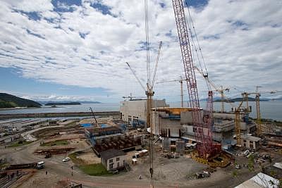 RIO DE JANEIRO, Nov. 19, 2013 (Xinhua/IANS) -- Photo taken on Nov. 18, 2013 shows the construction site of the Angra III nuclear power plant in the city of Angra dos Reis, Rio de Janeiro. Angra Nuclear Power Plant is the only nuclear power plant in Brazil. It locates on the Itaorna Beach in the city of Angra dos Reis of Rio de Janeiro. Currently it has two pressurized water reactor, Angra I, with a gross output of 640 Mega Watts of electricity and Angra II with a gross output of 1350 Mega Watts