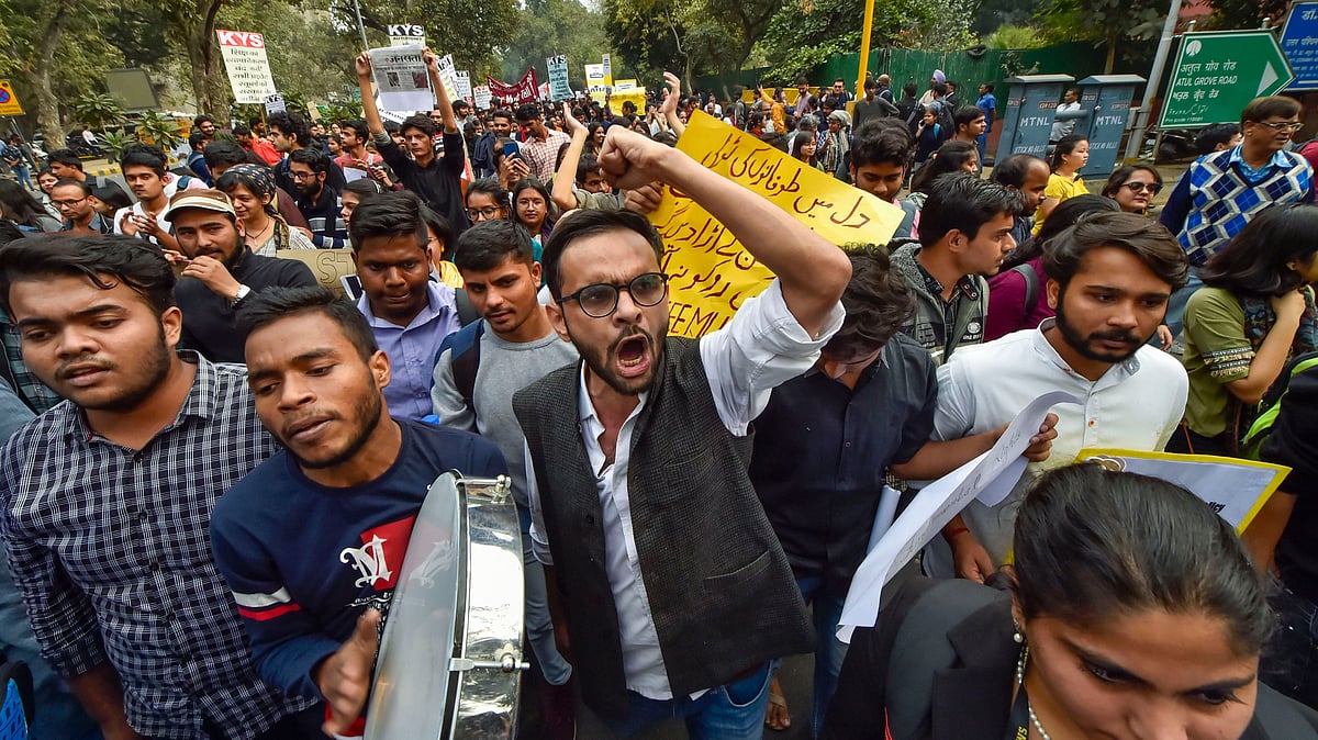 File image of Umar Khalid with fellow protesters gathered at Mandi House.