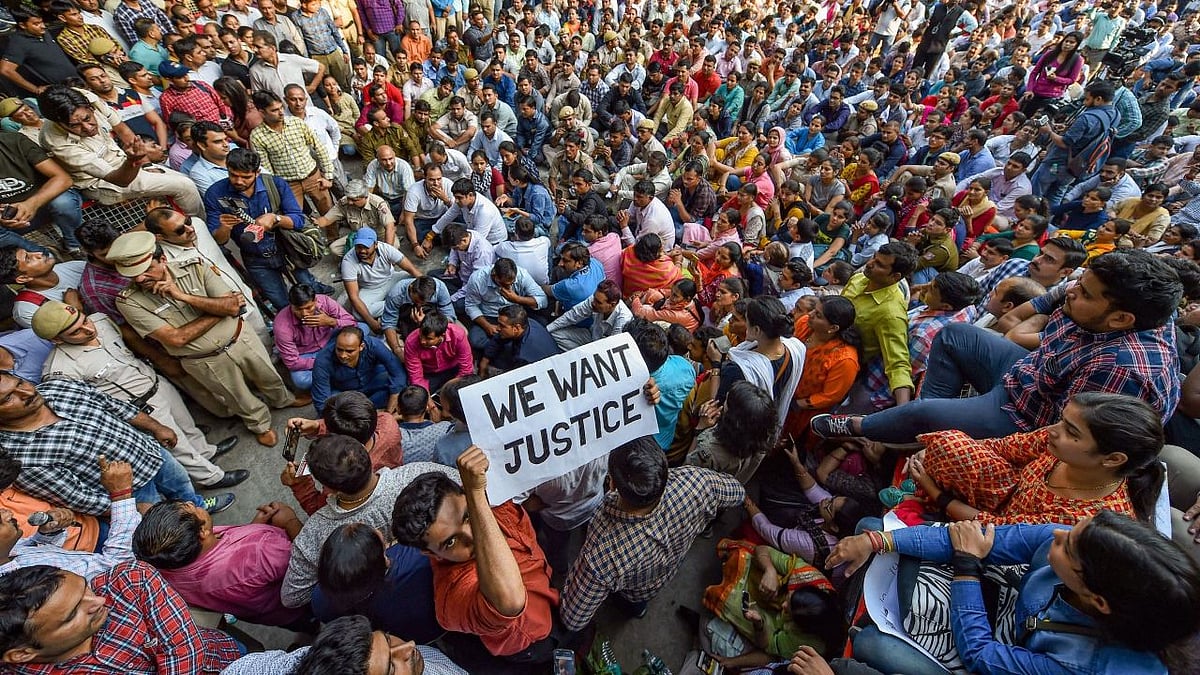 Police personnel gathered outside the police headquarters ITO to protest the assault on policemen following clashes with lawyers at Tis Hazari court.