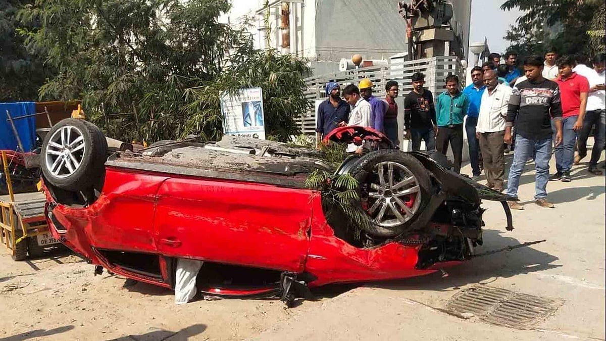 Mangled remains of the car that fell off the bio-diversity flyover in Hyderabad. A woman died on the spot while eight others sustained serious injuries.
