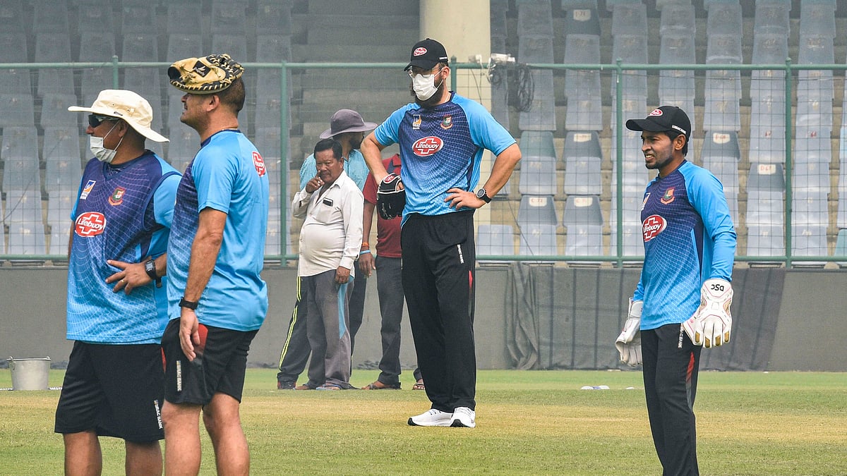 Bangladeshi cricketer Mushfiqur Rahim with coach Daniel Vettori and other support staff members during a practice session at Arun Jaitley Stadium in New Delhi, Friday, Nov. 1, 2019. 