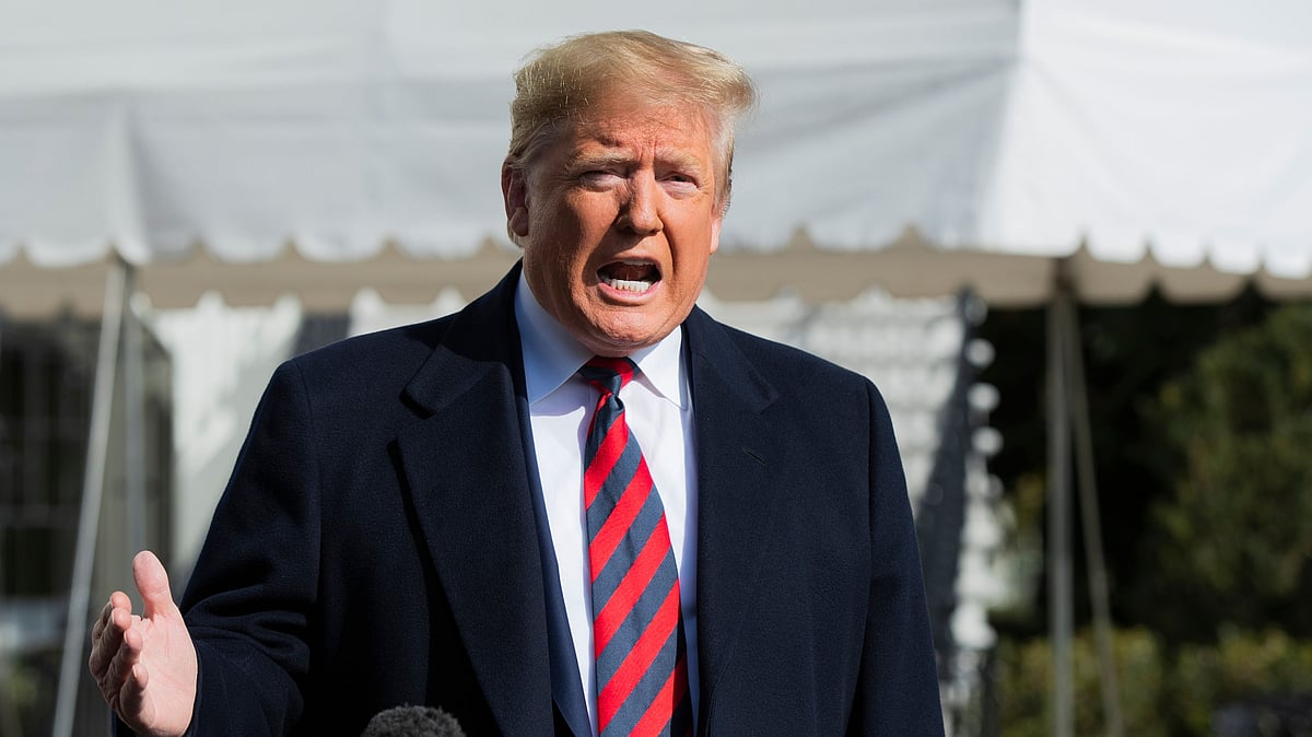 President Donald Trump talks to the media before leaving the White House on 9 November in Washington.&nbsp;