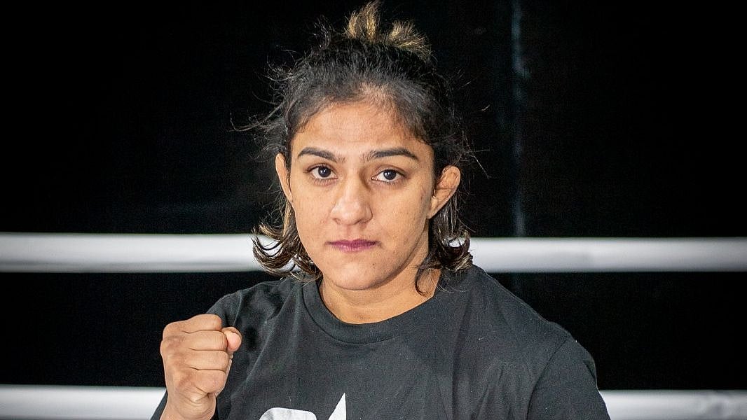 Ritu Phogat won by first round TKO.