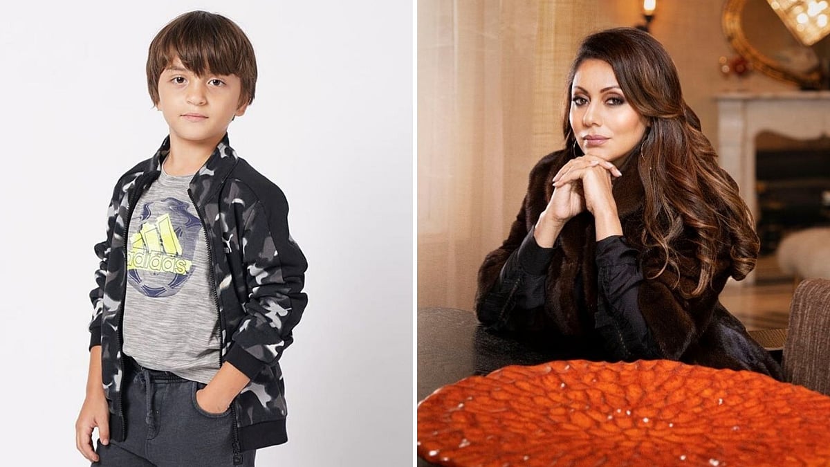 AbRam and Gauri Khan strike a pose.