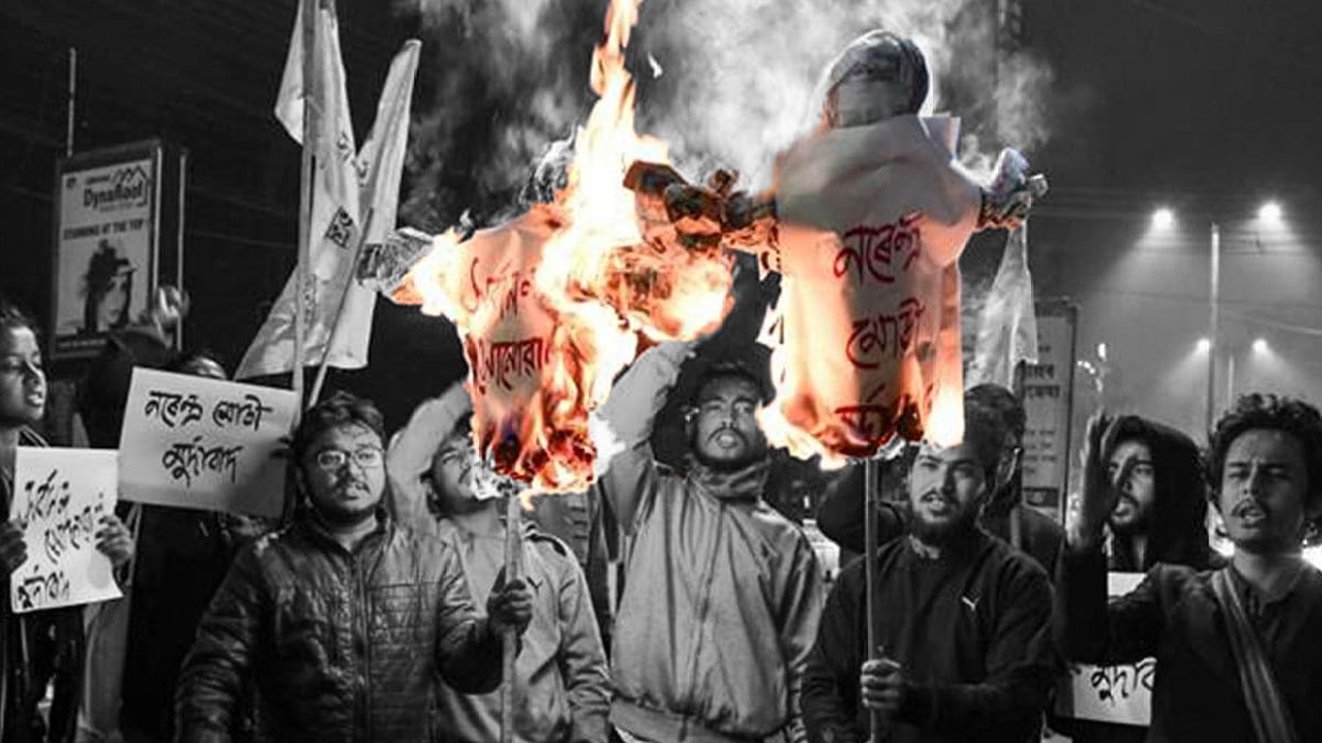 Demonstrators burn tyres and raise slogans in protest against CAB.