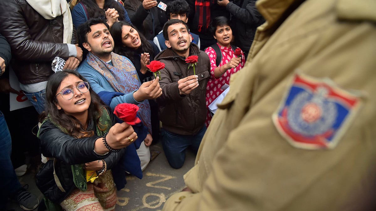 Protesters said  police can baton charge them as much as they want but their message is “love in return for hatred.”