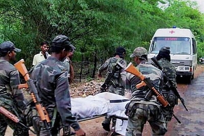 Kohkatoli: Security personnel carry the body of a CRPF personal who was killed in an encounter between security forces and Maoists, in Keshkutul area of Chhattisgarh
