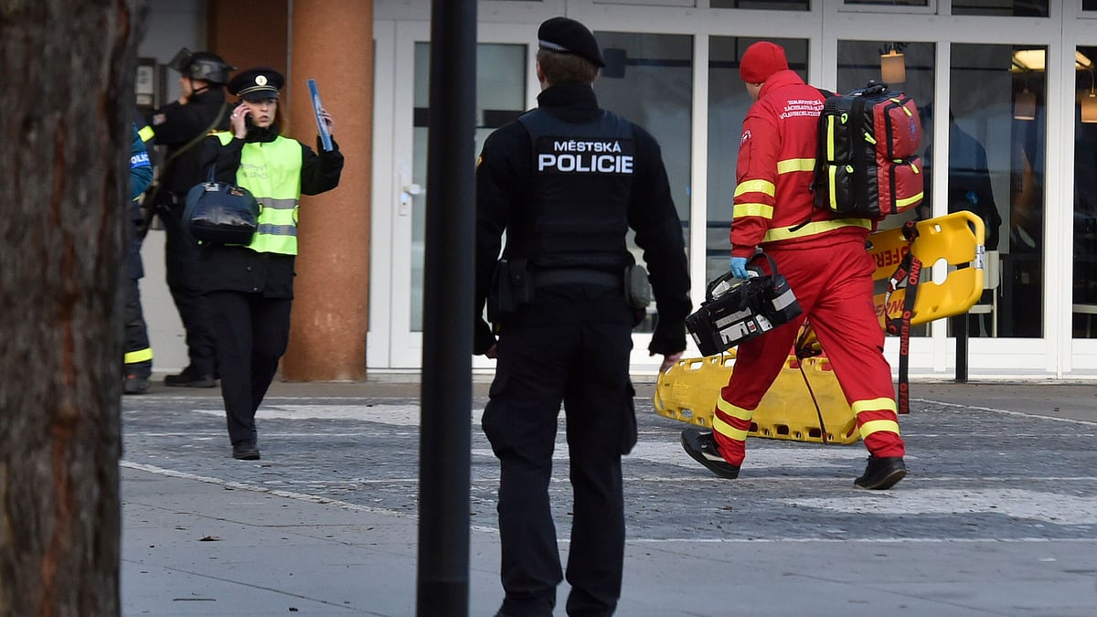 Police personnel and paramedics outside the Ostrava Teaching Hospital