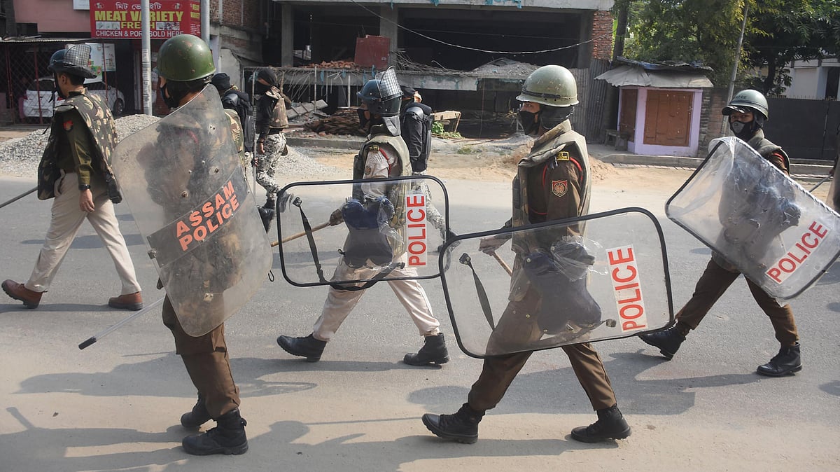 Security personnel patrol a street during curfew a day after unrest against the Citizenship Amendment Bill, at GS Road in Guwahati on Thursday, on 15 December.&nbsp;