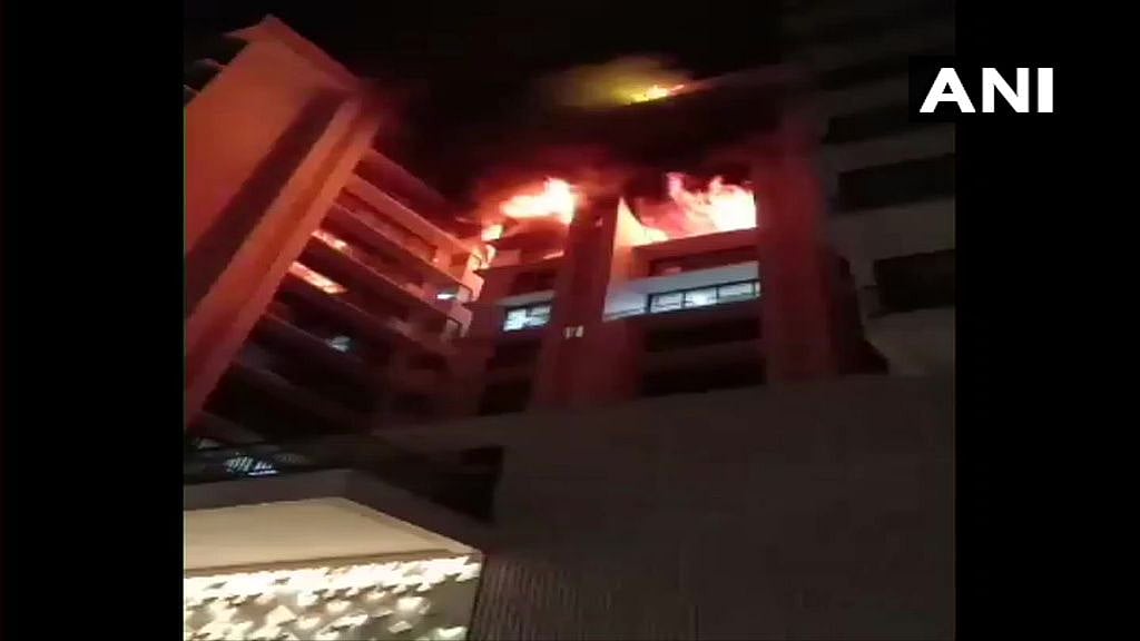 The fire is reported to be confined to the 7th and 8th floor of the building.