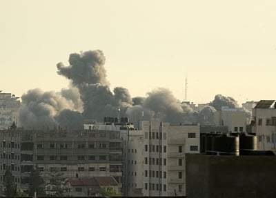 GAZA, May 5, 2019 (Xinhua) -- Smoke rises during an Israeli airstrike on Gaza City, on May 5, 2019. At least 20 Palestinians, including two infants and two pregnant women, have been killed in intensive Israeli airstrikes on the Gaza Strip since Saturday evening. (Xinhua/Yasser Qudih/IANS)