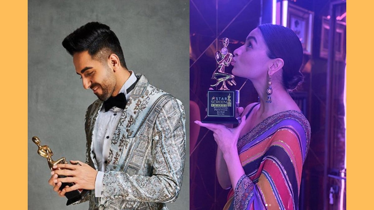 Ayushmann Khurrana and Alia Bhatt with their awards.