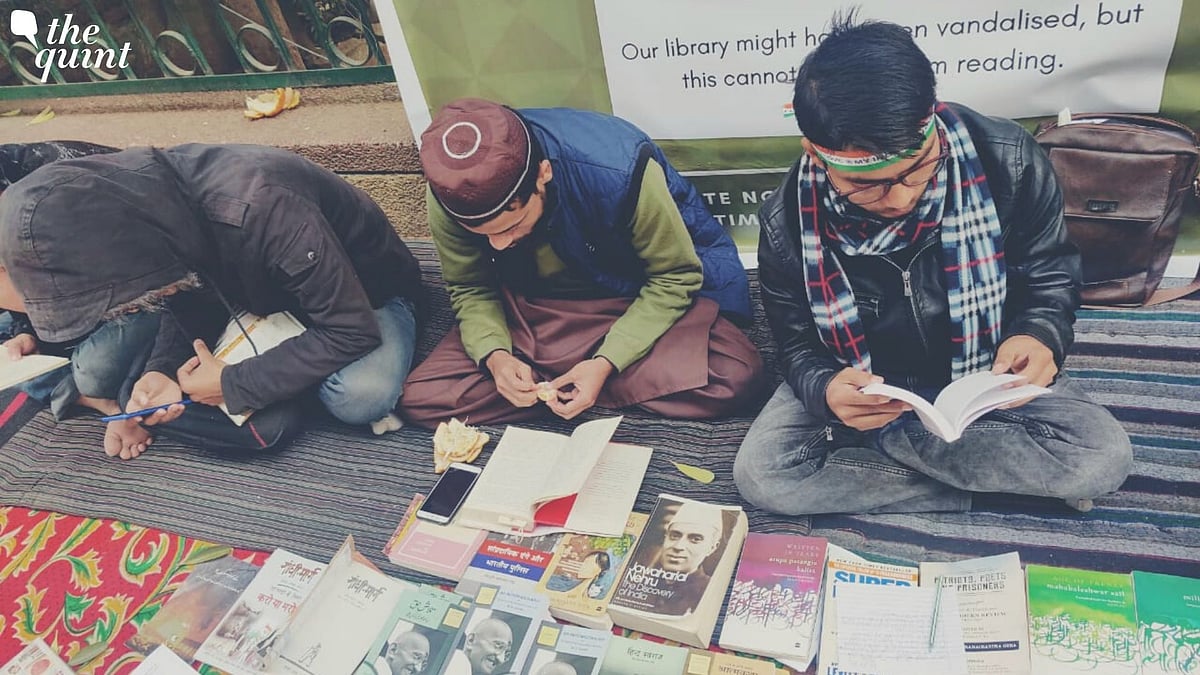 Days after Jamia’s library was vandalised in police action, students open one on the streets, pledge to ‘Read for Revolution.’