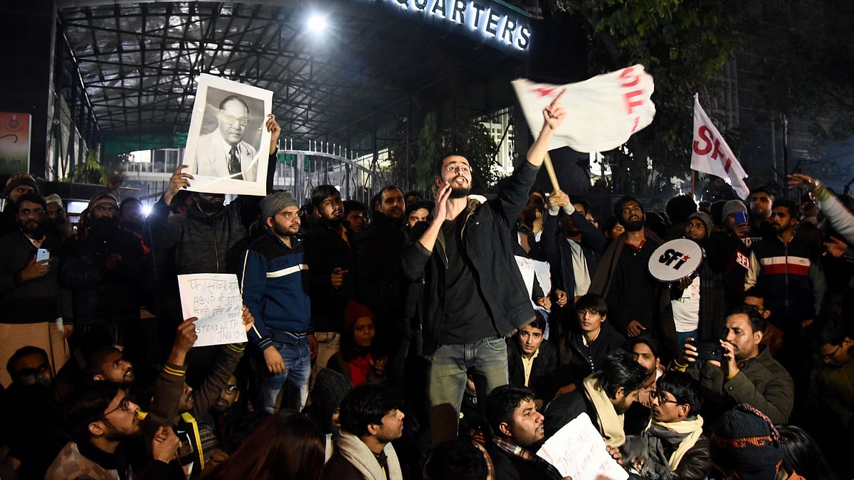 Protests against the JNU violence at the Delhi police headquarters in New Delhi.