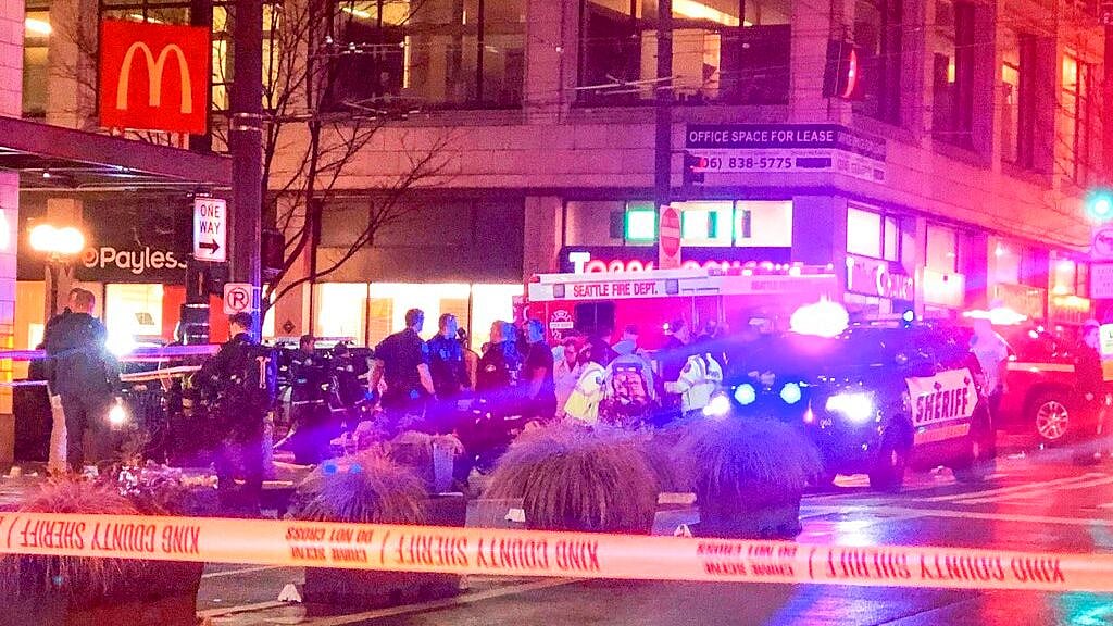 Police work the scene of a shooting on Third Avenue and Pine Street, Wednesday, 22 January 2020, in Seattle. 