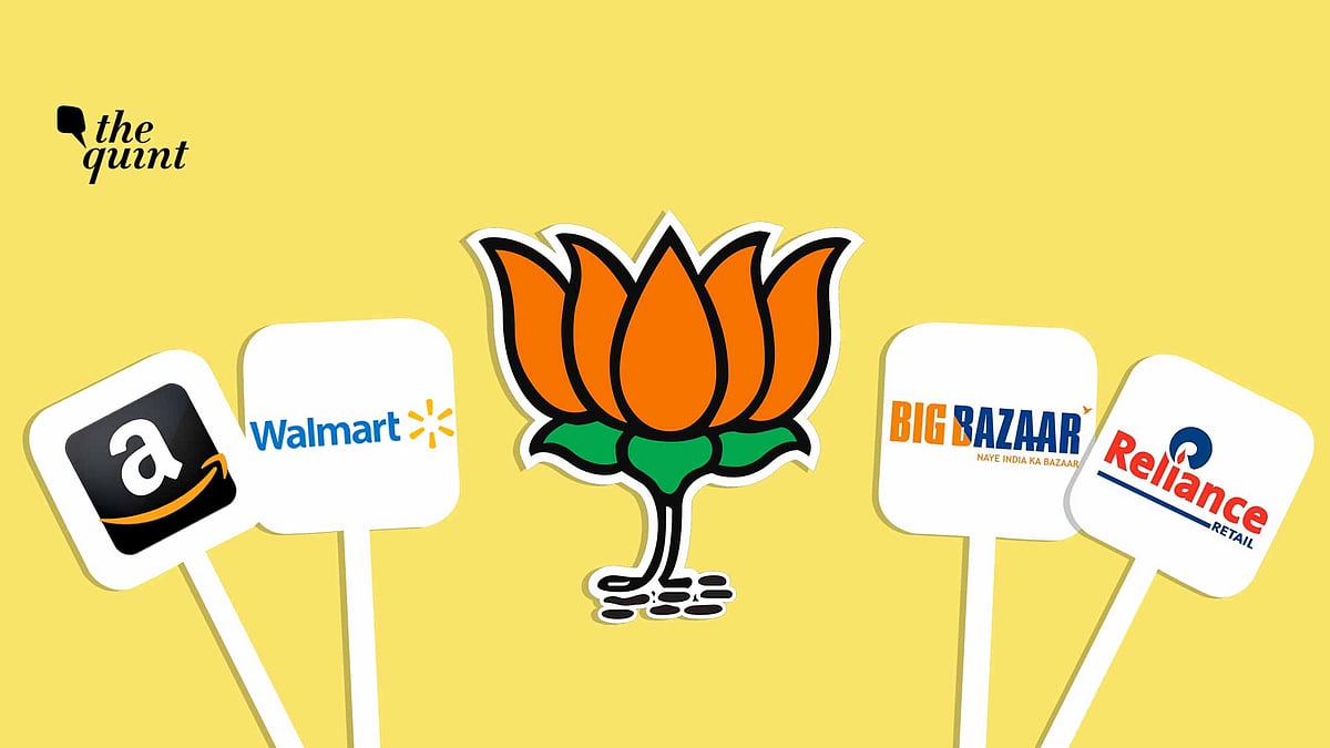 Image of Indian and logos of foreign big retail giants used for representational purposes.