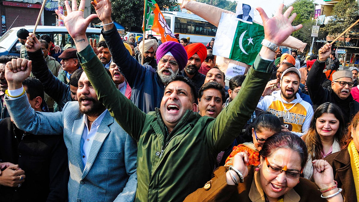 BJP workers shout slogans during a protest against Pakistan over alleged attack at on Pakistans Nankana Sahib Gurdwara. 
