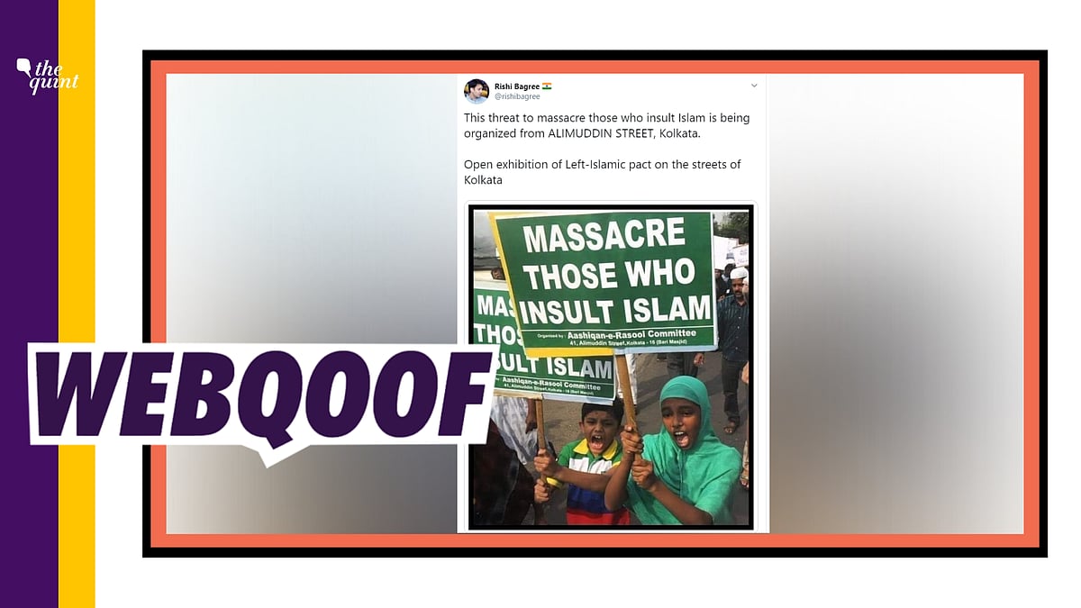 A misleading image of two children holding placards that say ‘Massacre those who insult Islam’ is circulating on social media.