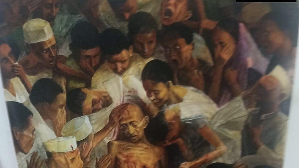 The cover page, designed by renowned artist Tom Vattakuzhi, shows Gandhi lying among his followers after being shot by his assassin Nathuram Godse.