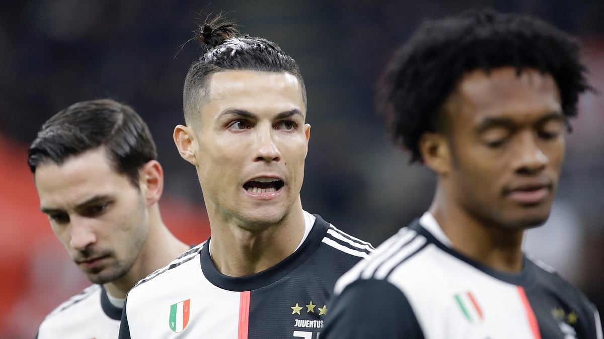 Cristiano Ronaldo scored a late penalty on Thursday, 13 February to help Juventus salvage a 1-1 draw at 10-man AC Milan.
