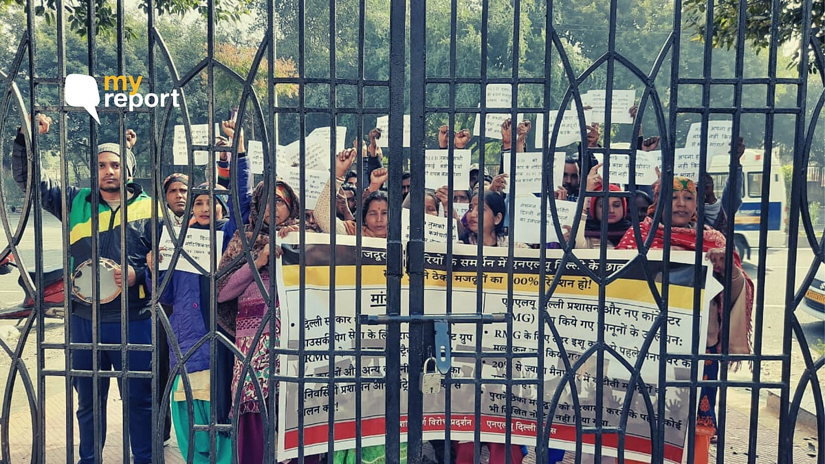 Safai karamcharis of NLU-Delhi protest their wrongful termination. 